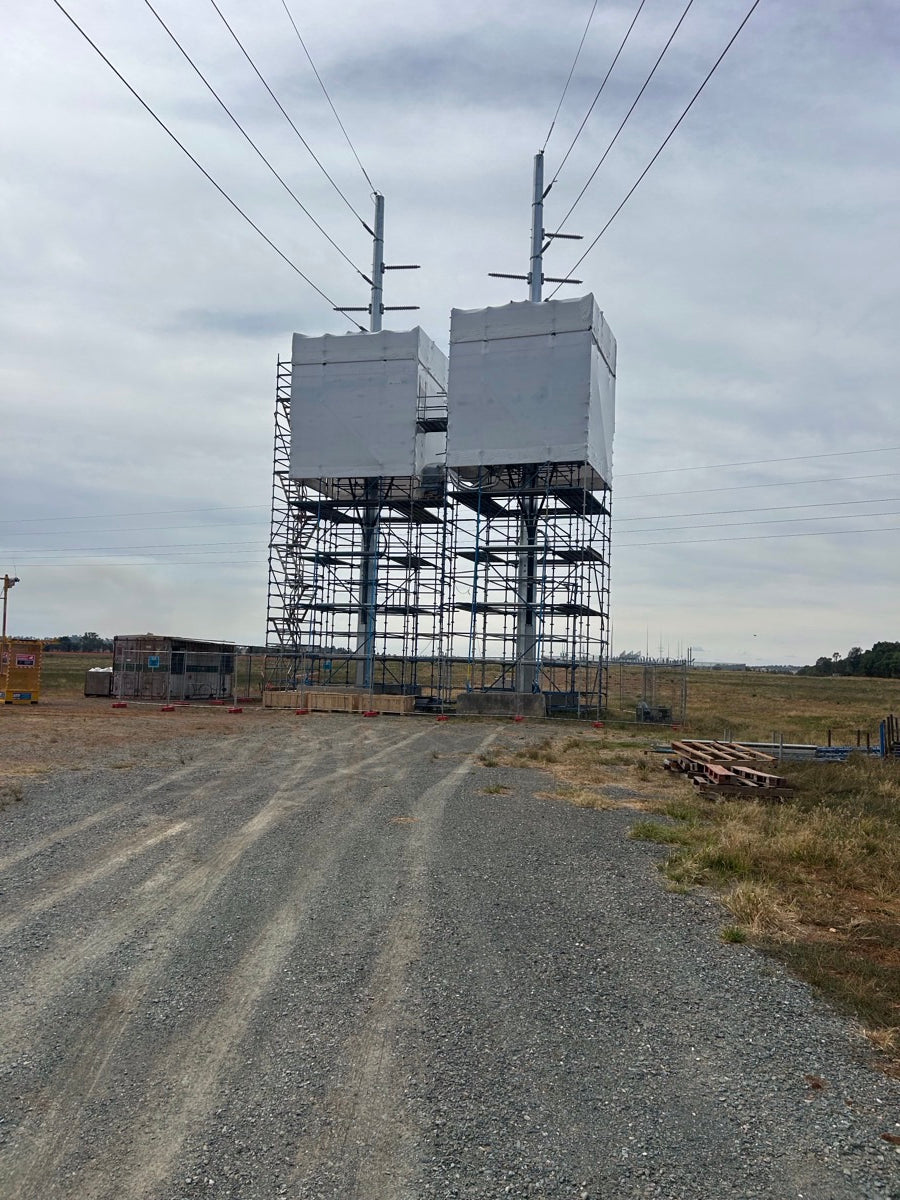 Scaffolding hire in Parkes NSW: access scaffolding supporting Essential Energy electricity pole maintenance at height