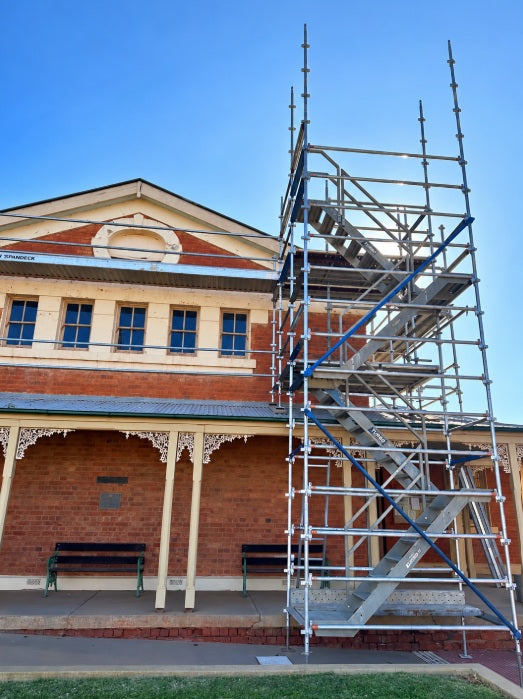 Scaffolding hire Cobar NSW: perimeter facade scaffolding and stair access on the 1887 Cobar Courthouse heritage restoration