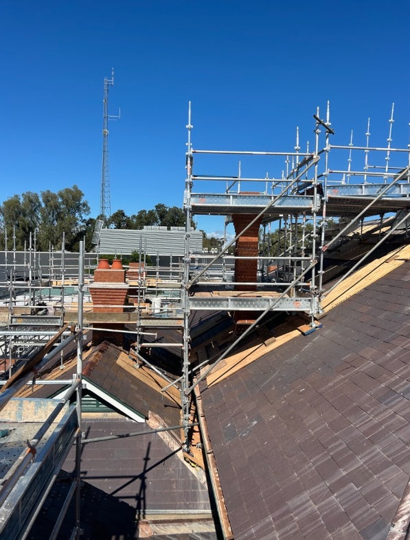 Scaffolding hire Moree NSW: facade scaffolding erected at Moree Courthouse heritage building without damage to the roof