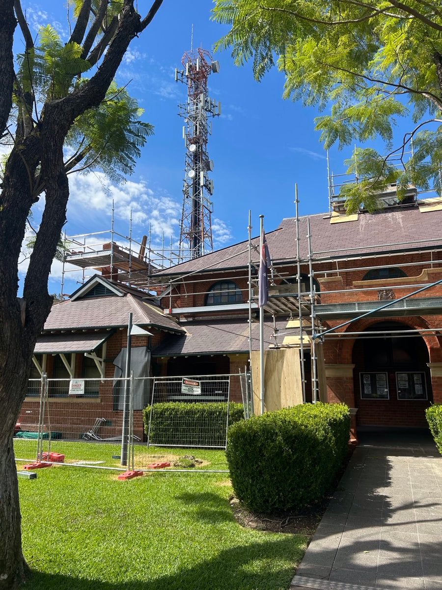Scaffolding hire in Moree NSW: scaffolding around the heritage chimney at Moree Courthouse for stonework restoration