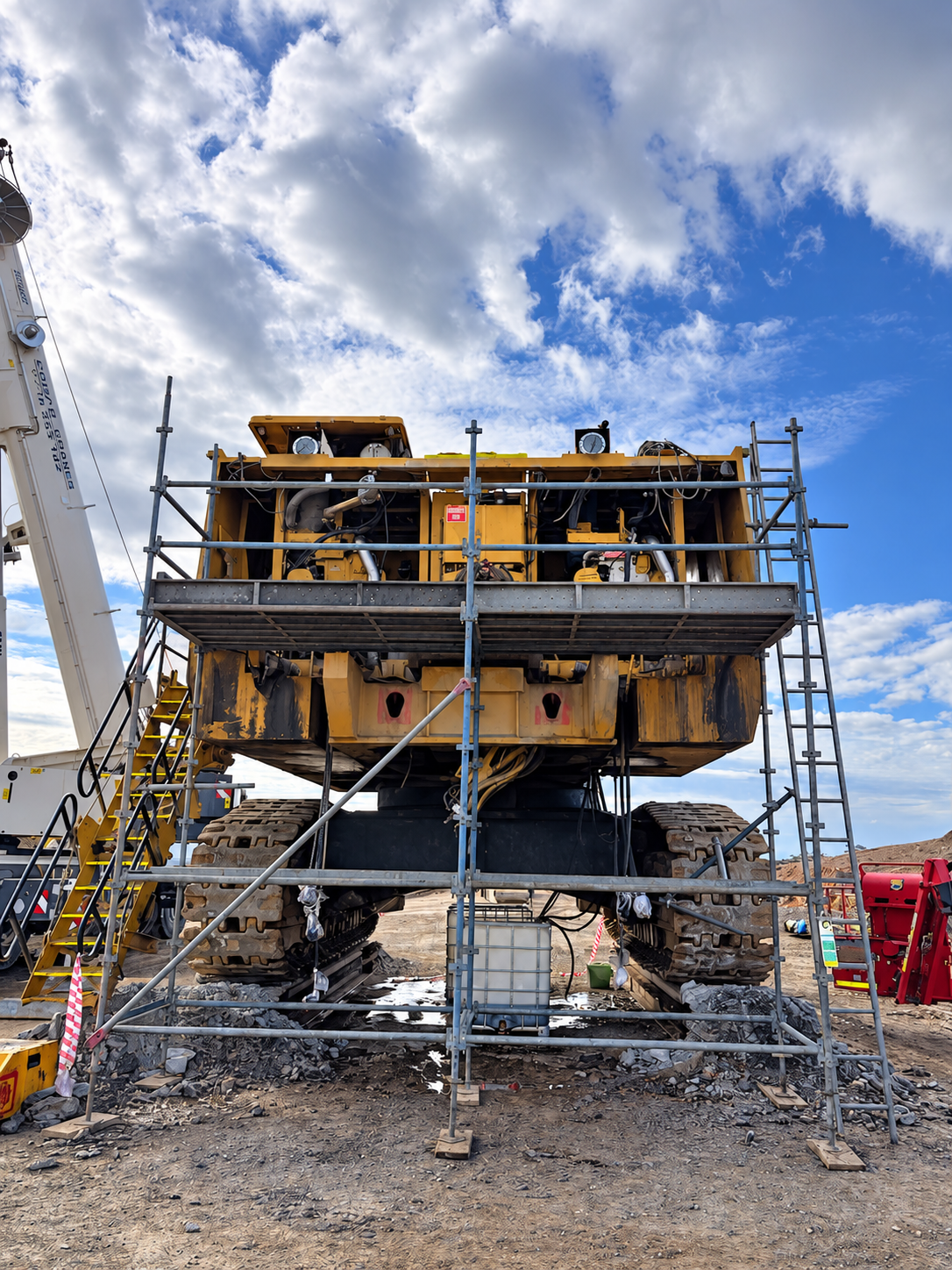Scaffolding hire Nyngan NSW: scaffold access platform on heavy mining machinery during on call maintenance at Tritton Mine